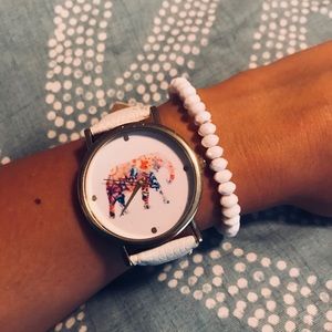 White leather elephant watch